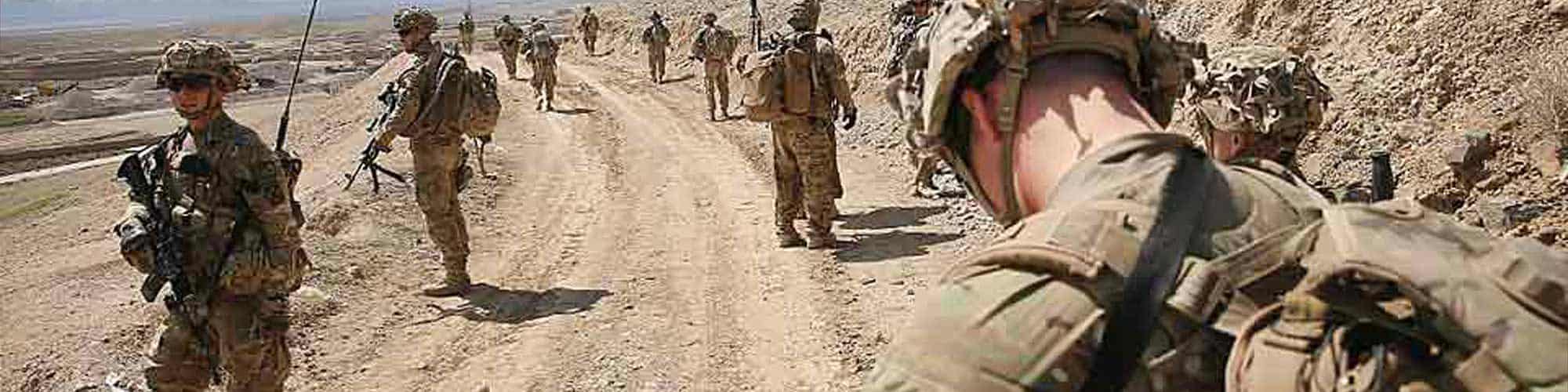 Troops roadside preparing for the enemy